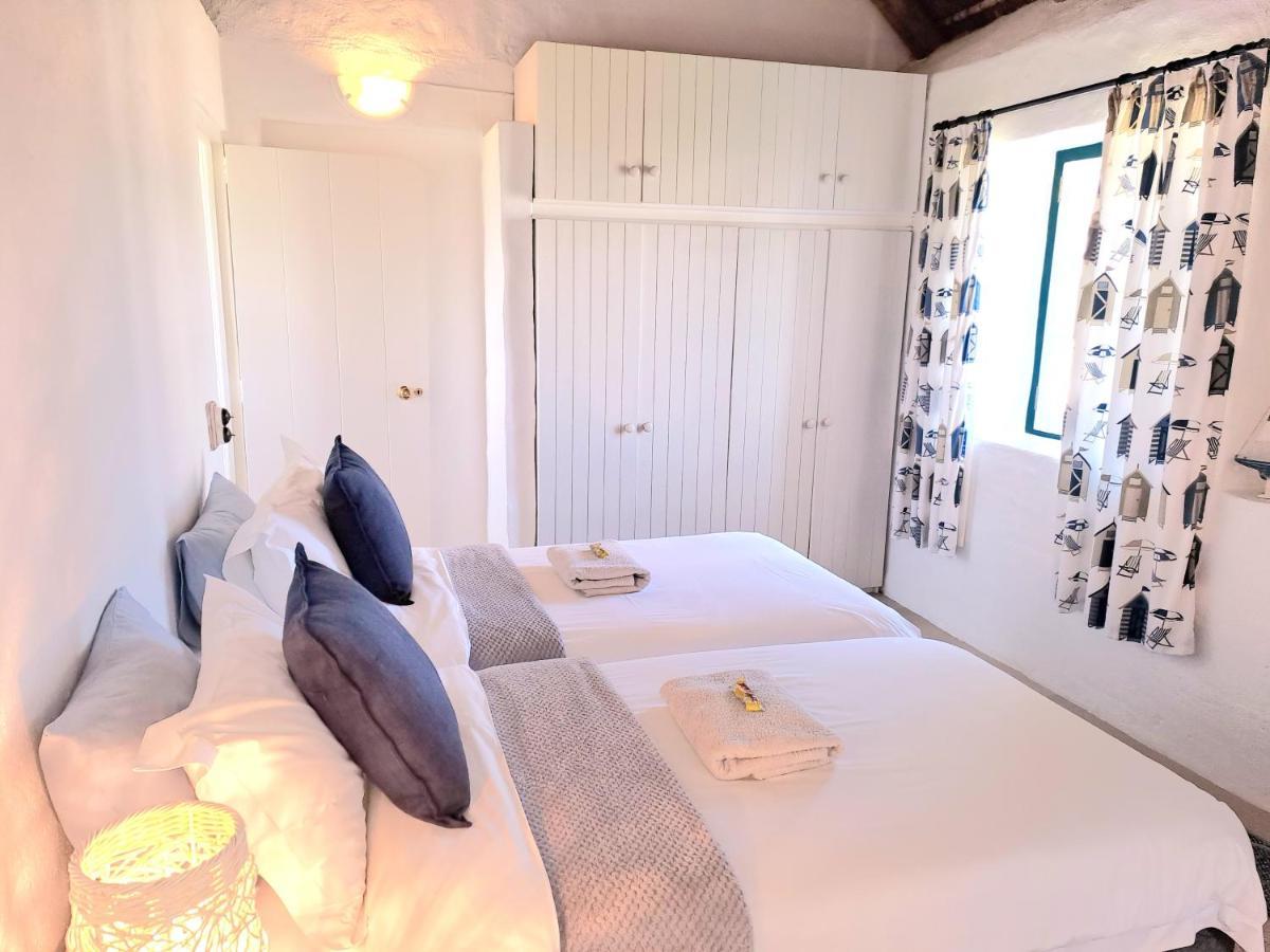 Zandtorini Seaside Cottage สตรุยส์บาย ภายนอก รูปภาพ